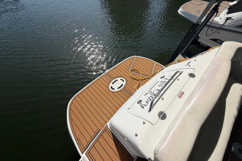 Slide: The Image of 2005 Sea Ray Sundancer 280 boat with teak swim platform on calm water. - 5