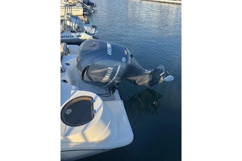 Slide: The Image of 2015 Sea Fox 249 Avenger with Yamaha 300 outboard engine at marina. - 13