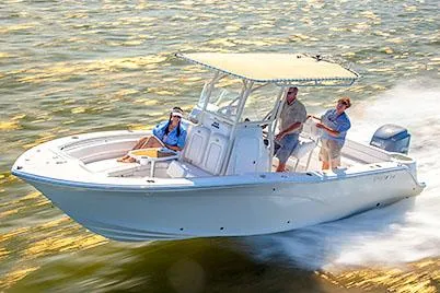 Slide: The Image of Manufacturer Provided Image: 2015 Sea Fox 249 Avenger boat cruising on water with three passengers. - 16