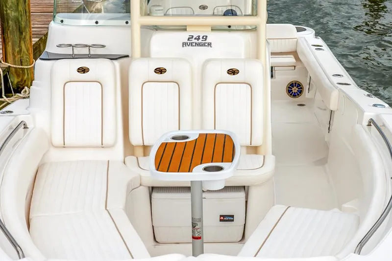 Slide: The Image of Manufacturer Provided Image: 2015 Sea Fox 249 Avenger boat interior with seating and table. - 17