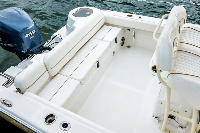 Slide: The Image of Manufacturer Provided Image: 2015 Sea Fox 249 Avenger boat interior with seating and 250 HP engine. - 18