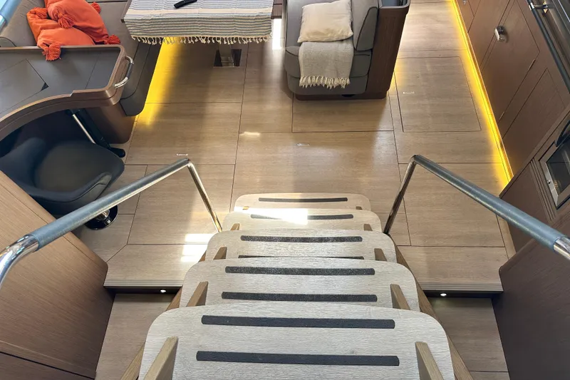 Slide: The Image of Luxurious interior of 2019 Beneteau Oceanis Yacht 62 with modern design and cozy seating. - 22