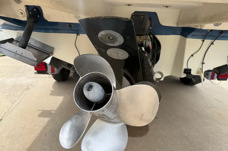 Slide: The Image of Propeller of a 2003 Sea Ray 240 Bow Rider boat, close-up view. - 10