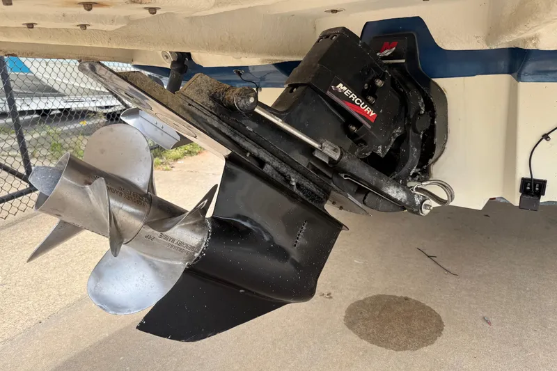 Slide: The Image of 2003 Sea Ray 240 Bow Rider with Mercury outdrive and stainless steel propeller. - 11