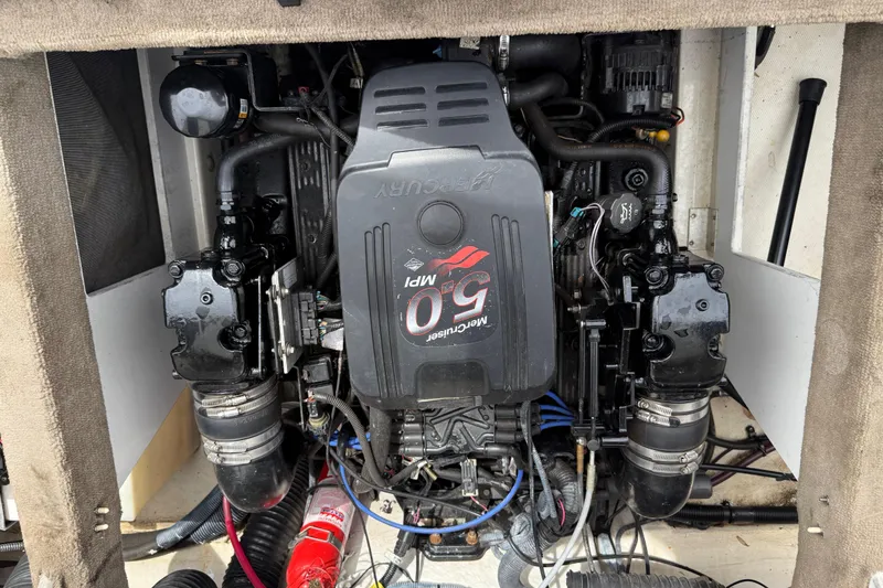 Slide: The Image of Engine compartment of a 2003 Sea Ray 240 Bow Rider with MerCruiser 5.0 MPI engine. - 31