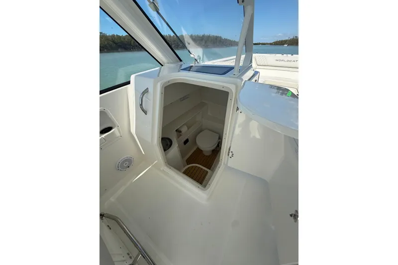 Slide: The Image of 2025 World Cat 280 DC-X boat interior with compact marine toilet. - 16