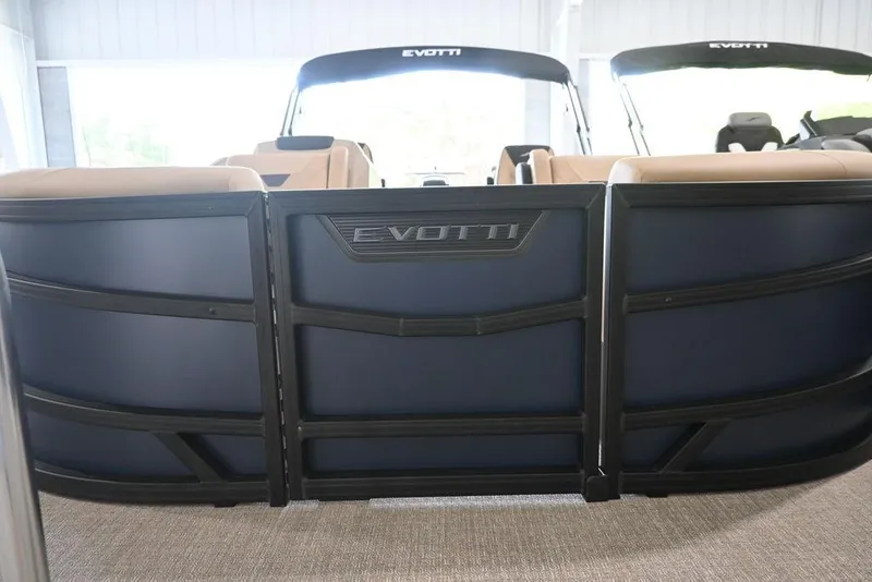 Slide: The Image of 2026 Evotti 523QL boat interior with beige seating and sleek design. - 6