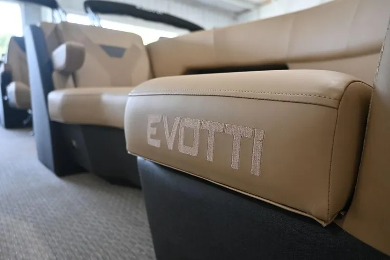 Slide: The Image of Luxurious Evotti 523QL 2026 boat interior with tan leather seating. - 7