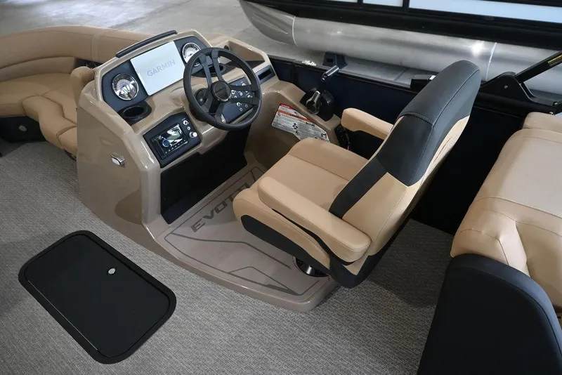 Slide: The Image of Captain's helm of 2026 Evotti 523QL boat with Garmin navigation system. - 8