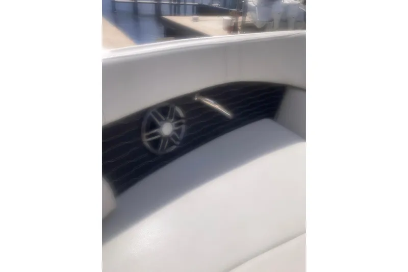 Slide: The Image of 2022 Sea Ray SPX 230 Outboard boat interior with sleek seating and modern design. - 12