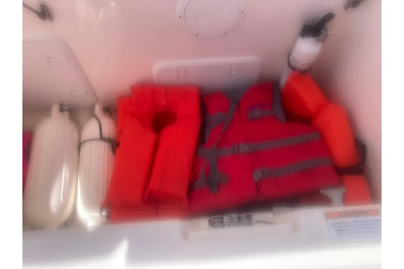 Slide: The Image of 2022 Sea Ray SPX 230 Outboard boat console with sleek design and glass windshield. - 17