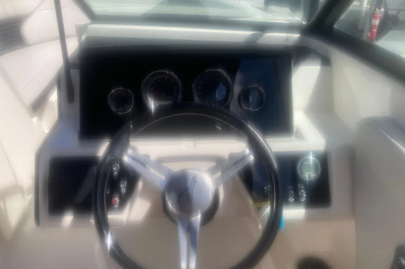 Slide: The Image of Close-up of 2022 Sea Ray SPX 230 Outboard model name on boat surface. - 20