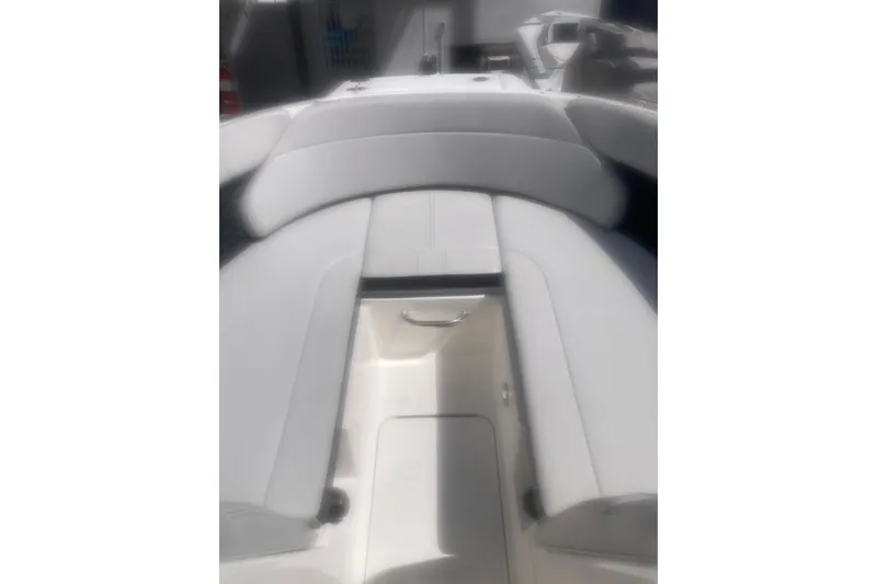 Slide: The Image of 2022 Sea Ray SPX 230 Outboard boat with "Popi Time" name, docked under a clear sky. - 6