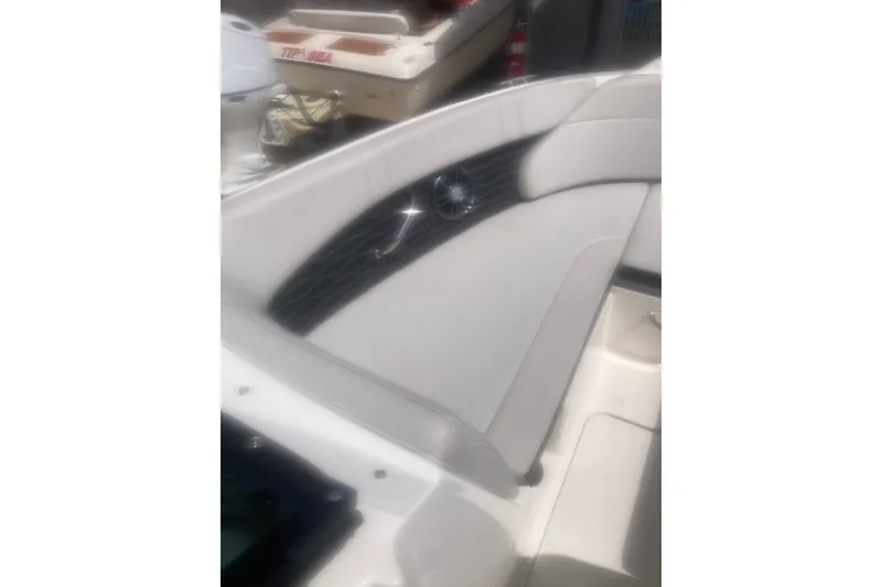 Slide: The Image of 2022 Sea Ray SPX 230 Outboard engine in a sunny marina setting. - 8