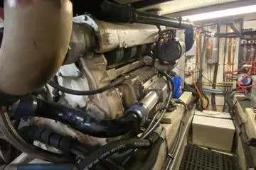 Slide: The Image of Engine room of a 1982 C @ L Sea Ranger boat, showcasing mechanical components. - 101
