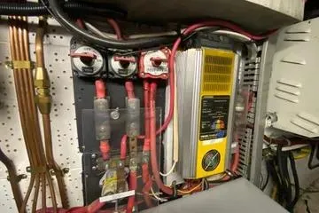 Slide: The Image of Electrical panel with wiring in a 1982 C @ L Sea Ranger boat. - 105