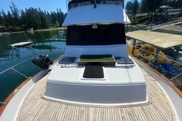 Slide: The Image of 1982 C @ L Sea Ranger boat docked in a serene marina setting. - 20