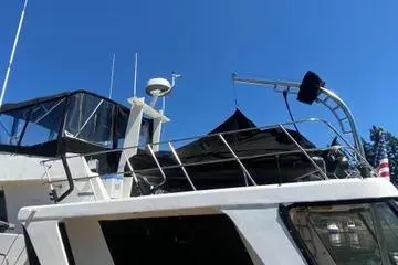 Slide: The Image of 1982 C @ L Sea Ranger boat with radar, blue sky background. - 26