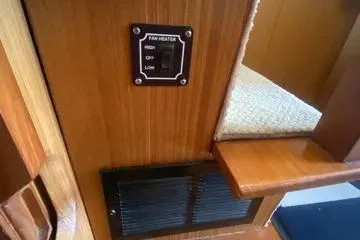 Slide: The Image of 1982 C @ L Sea Ranger interior with fan heater control panel and vent. - 53