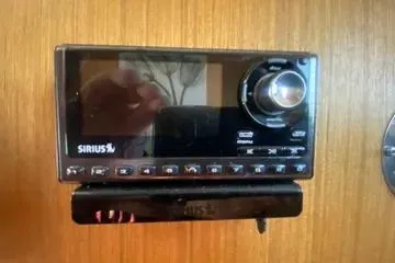 Slide: The Image of Sirius radio installed on 1982 C @ L Sea Ranger boat dashboard. - 65
