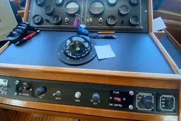 Slide: The Image of 1982 C @ L Sea Ranger control panel with compass and gauges. - 67