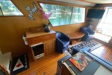 Slide: The Image of Interior of 1982 C @ L Sea Ranger yacht with wood paneling and modern decor. - 82