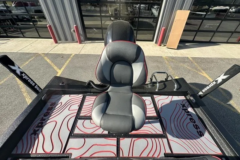 Slide: The Image of 2026 Xpress H22B Bay boat seat with custom design and branding. - 5