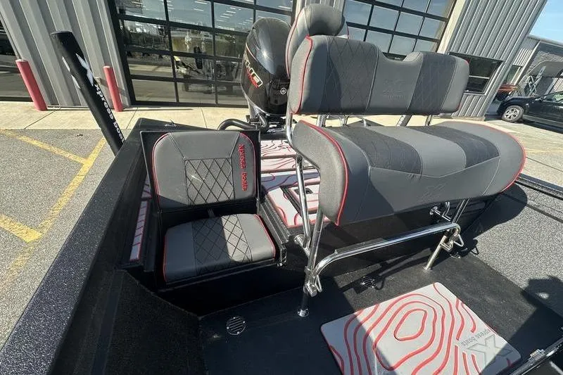 Slide: The Image of 2026 Xpress H22B Bay boat interior with cushioned seating and modern design. - 7