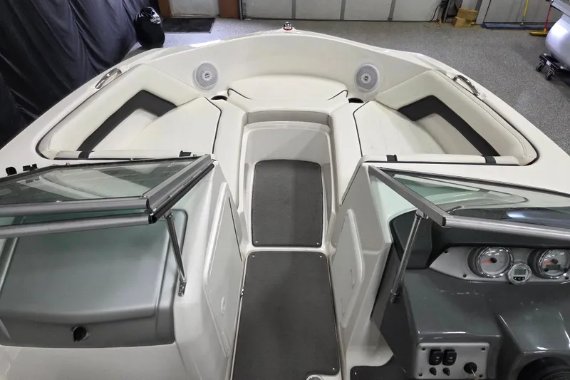 Slide: The Image of 2015 Yamaha Boats SX190 interior with seating and dashboard view. - 7