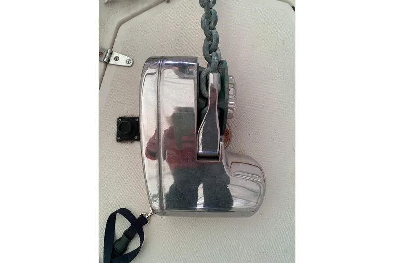 Slide: The Image of Chrome anchor windlass on 1984 Sabre 38 sailboat deck. - 10