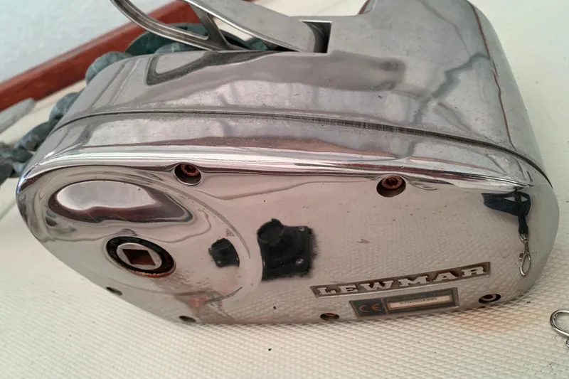 Slide: The Image of Chrome Lewmar winch on a 1984 Sabre 38 sailboat deck. - 11