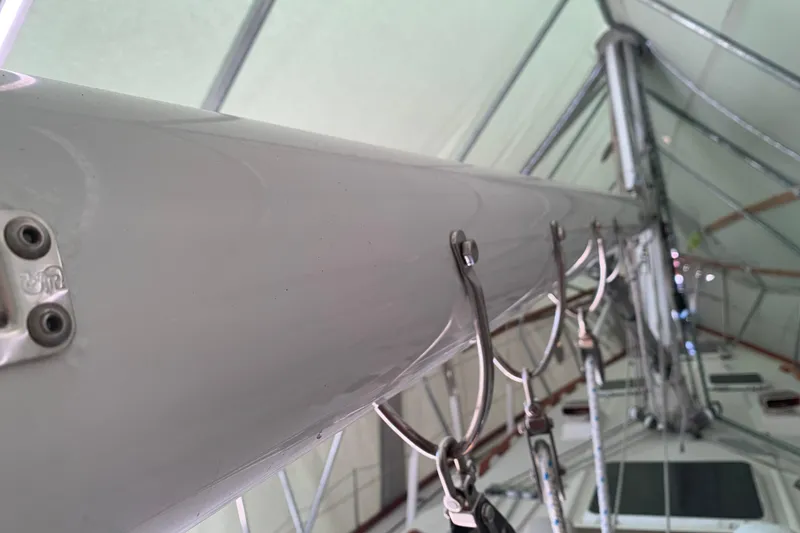 Slide: The Image of Close-up of a 1984 Sabre 38 sailboat mast with rigging details. - 22