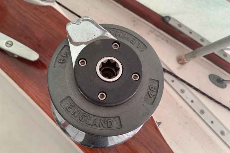Slide: The Image of Winch mechanism on 1984 Sabre 38 sailboat, featuring "Lewmar 48" and "England" engravings. - 24