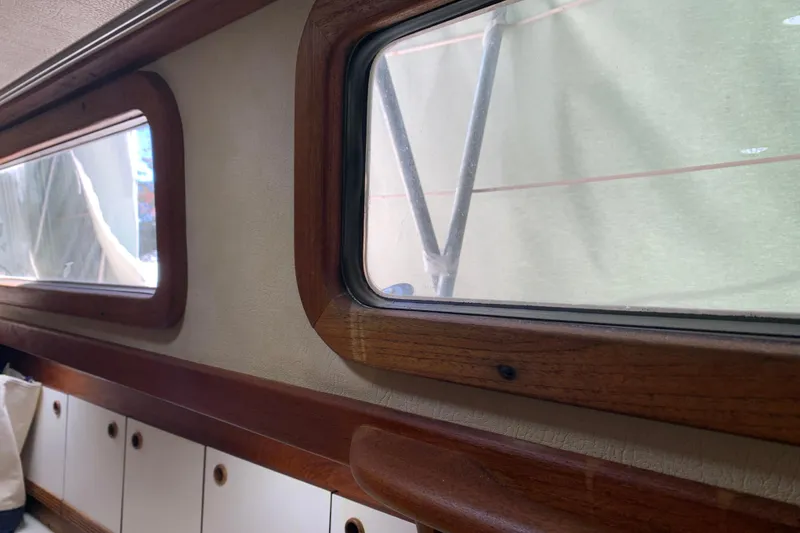 Slide: The Image of Interior view of 1984 Sabre 38 sailboat with wooden window frames. - 30