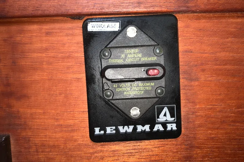 Slide: The Image of Circuit breaker panel on 1984 Sabre 38 sailboat, featuring Lewmar windlass control. - 52