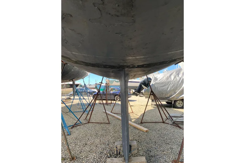 Slide: The Image of 1984 Sabre 38 sailboat keel on stands in a boatyard. - 6