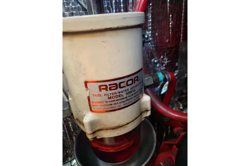 Slide: The Image of Racor fuel filter water separator in 1984 Sabre 38 engine compartment. - 61