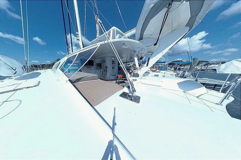 Slide: The Image of Sailing yacht Kelsall Manannan Custom 1988 on a sunny day at the marina. - 10