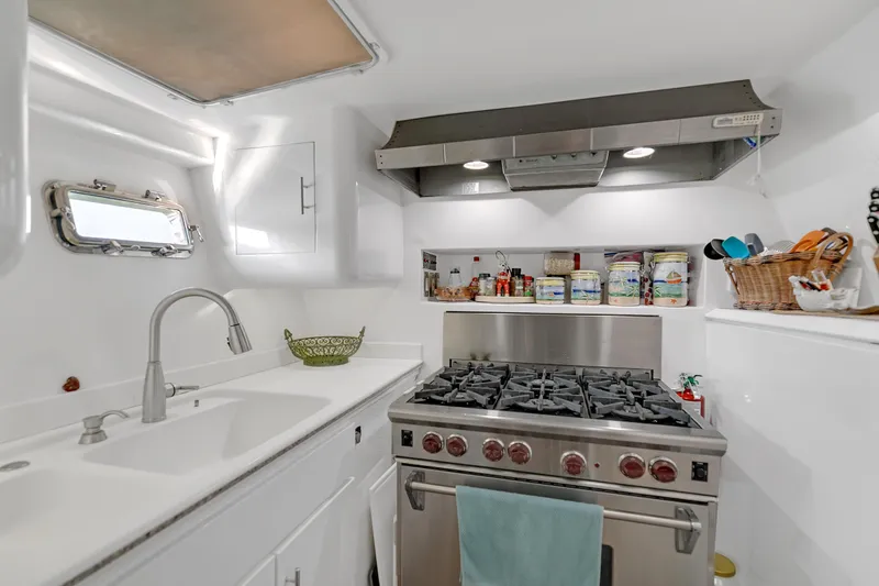 Slide: The Image of Kitchen of Kelsall Manannan 78 Custom yacht, built in 1988. - 15