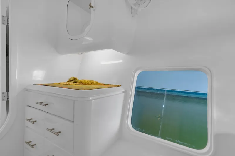 Slide: The Image of Interior of 1988 Kelsall Manannan Custom yacht with ocean view window. - 20