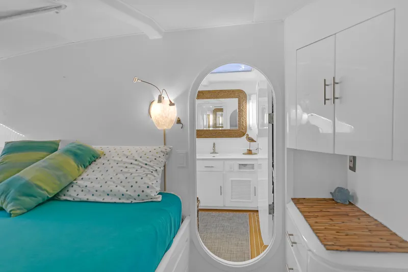 Slide: The Image of Interior of 1988 Kelsall Manannan Custom yacht with cozy bedroom and elegant bathroom. - 30
