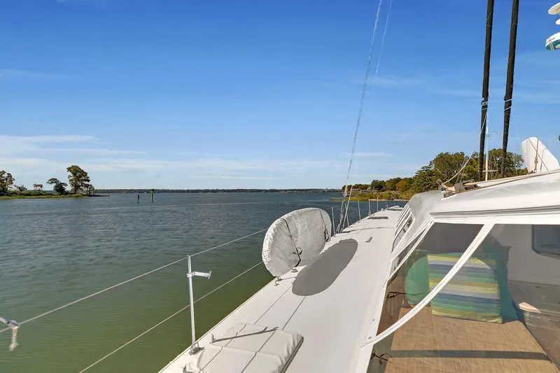 Slide: The Image of Sailing on a 1988 Kelsall Manannan Custom yacht, serene waters, clear blue sky. - 4