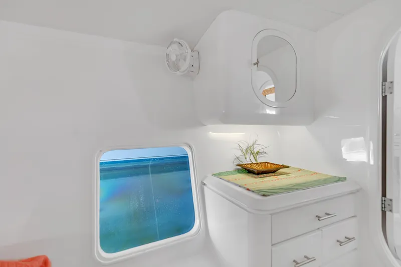 Slide: The Image of Interior of 1988 Kelsall Manannan Custom yacht with ocean view window. - 49