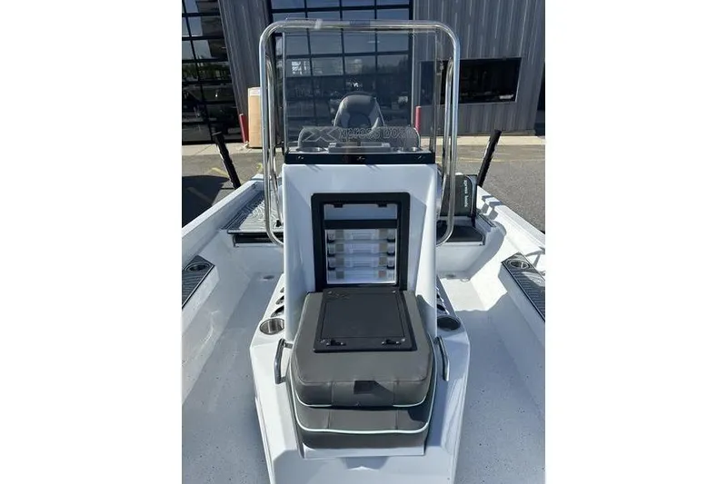 Slide: The Image of 2026 Xpress H22B Bay boat interior with storage compartments and seating. - 12