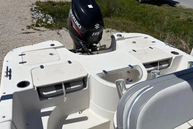 Slide: The Image of 2014 Carolina Skiff 218 DLV boat with Suzuki 115 outboard motor, rear deck view. - 5