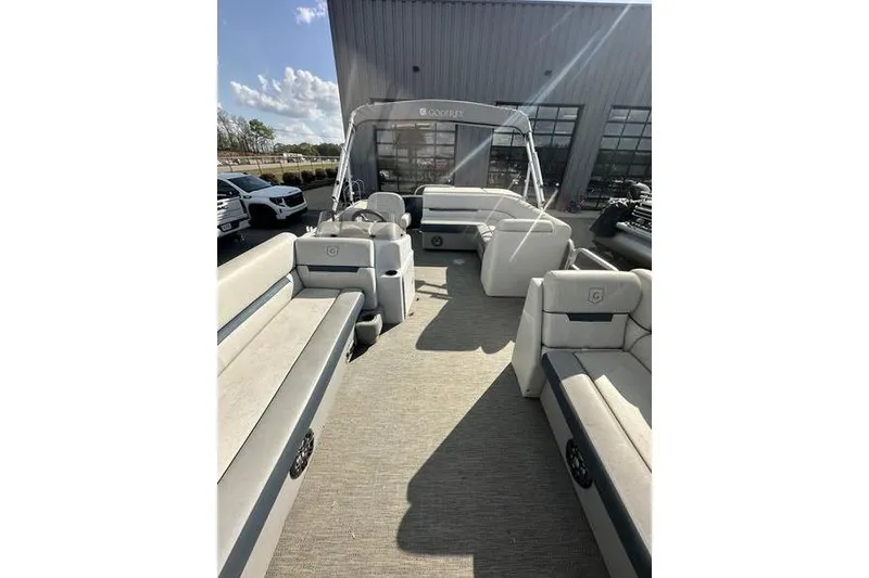 Slide: The Image of 2021 Godfrey Sweetwater 2186 C pontoon boat interior with spacious seating and modern design. - 3
