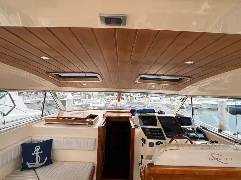 Slide: The Image of Interior of a 2003 Apreamare 40 yacht with wooden accents. - 20