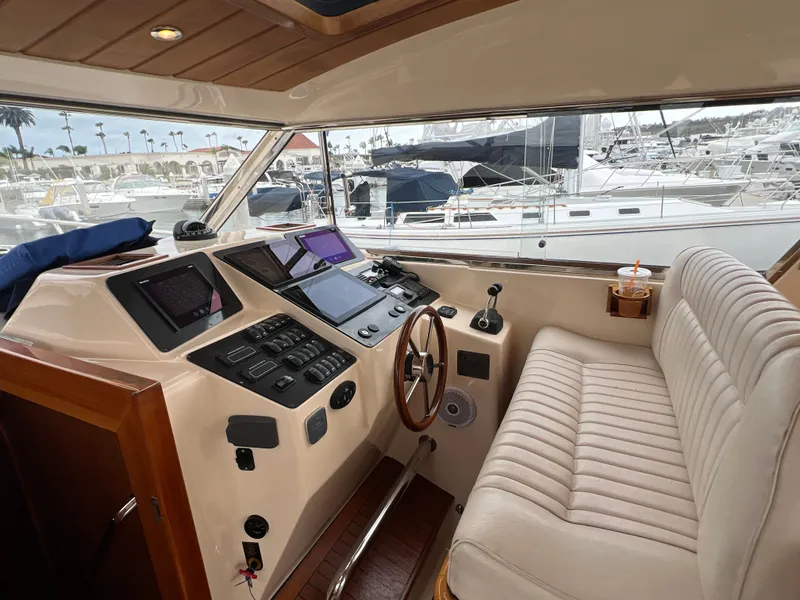 Slide: The Image of Interior view of 2003 Apreamare 40 yacht with helm console. - 21