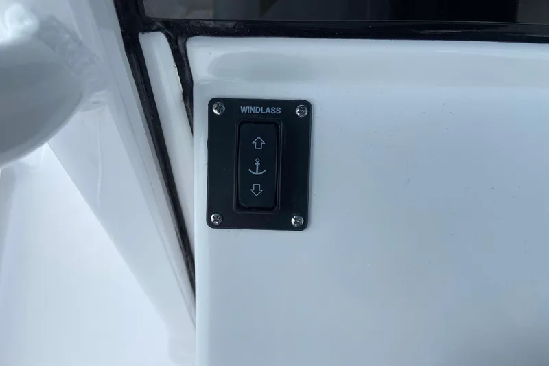 Slide: The Image of Windlass control panel on 2026 Sportsman Open 302 Center Console boat. - 30