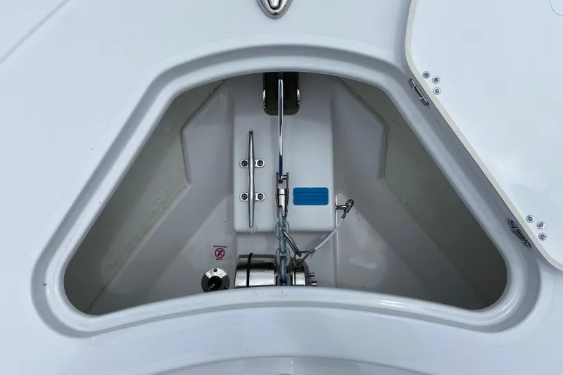 Slide: The Image of Anchor compartment of 2026 Sportsman Open 302 Center Console boat. - 44